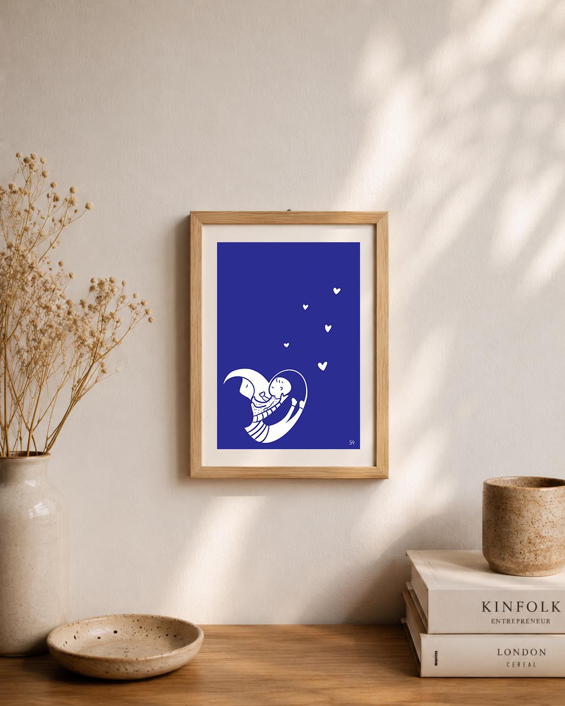 Illustration d'un coeur avec une maman et un bébé