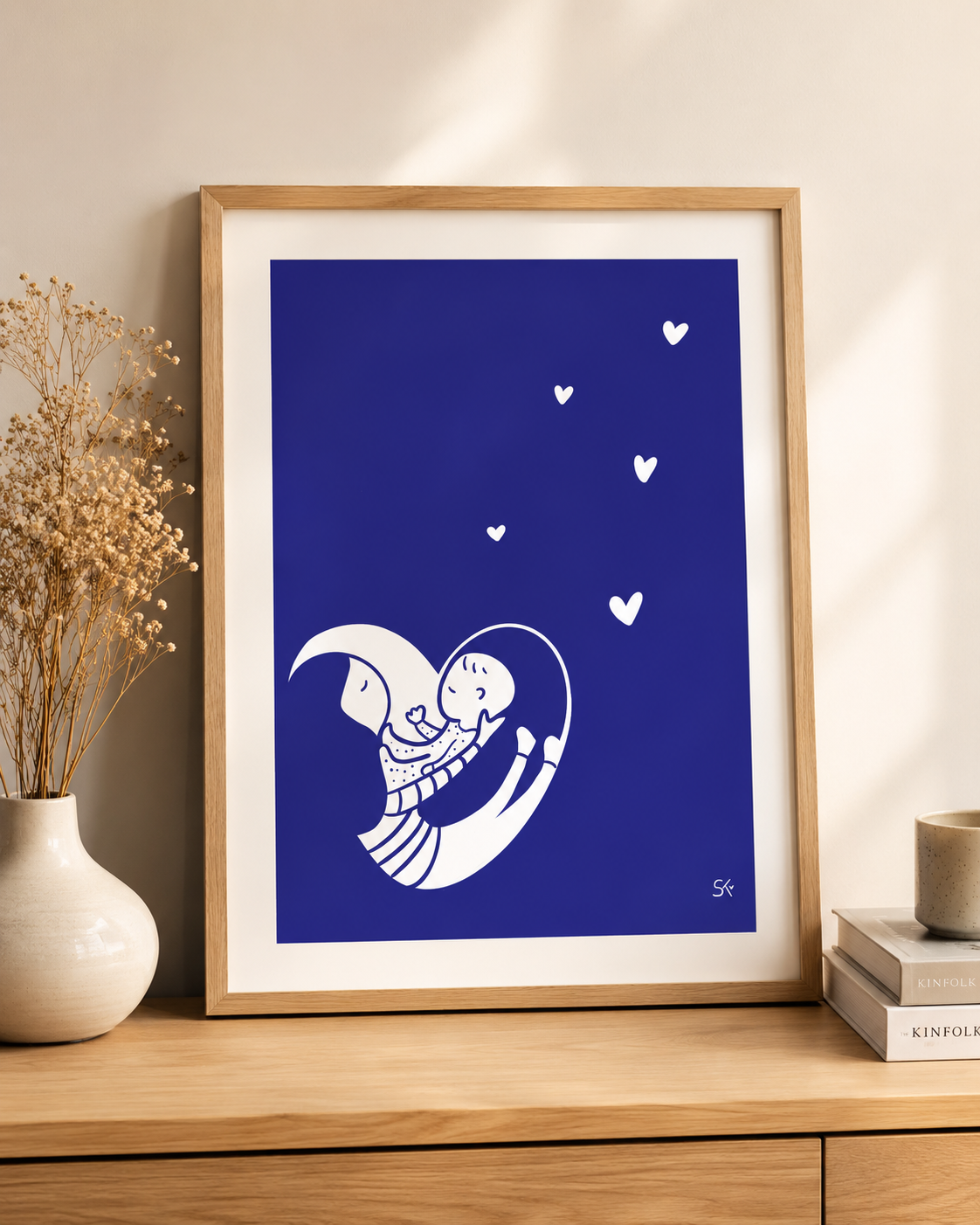 Illustration d'un coeur avec une maman et un bébé
